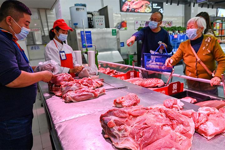 Price of Pork Falls in China as Market Glut Fails to Clear in Run Up to Lunar New Year Break