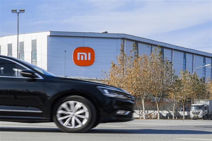 Xiaomi Can Catch Up After Late Start in Car Market, Founder Says