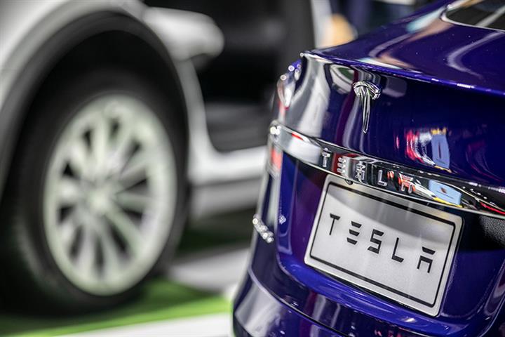 Tesla, Evergrande Are Among EV Startups Missing From Shanghai Auto Show
