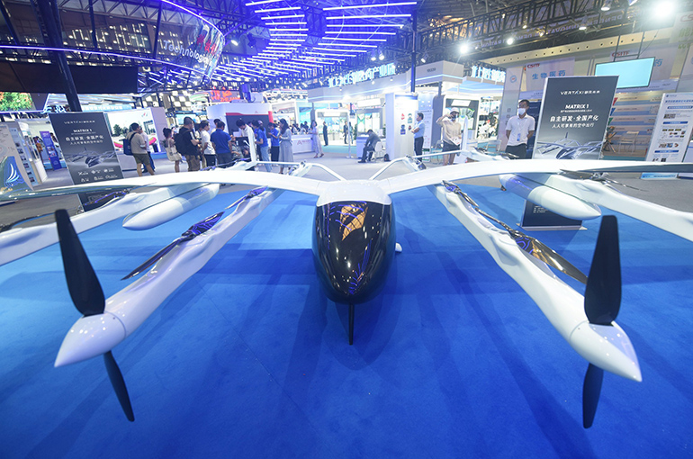 Shanghai's 9th Int'l Tech Fair Wows With Electric Plane, Unmanned Machinery