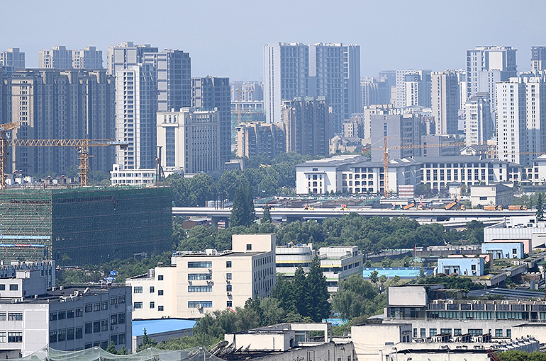 Hangzhou Lifts Curbs on Number of Apartment Purchases; Move May Boost Year-End Sales, Expert Says