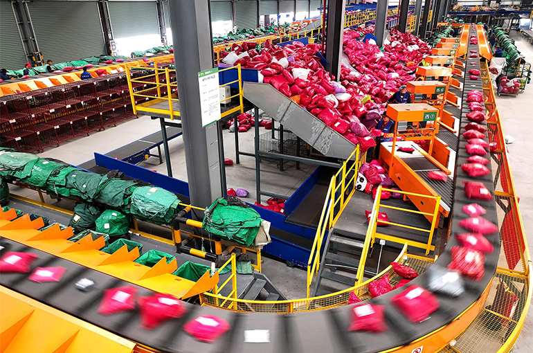 China’s Couriers Deliver Record Number of Parcels in 2023, Report Says