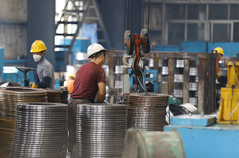 China’s Factory Activity Hits Four-Month High in December, Caixin PMI Shows