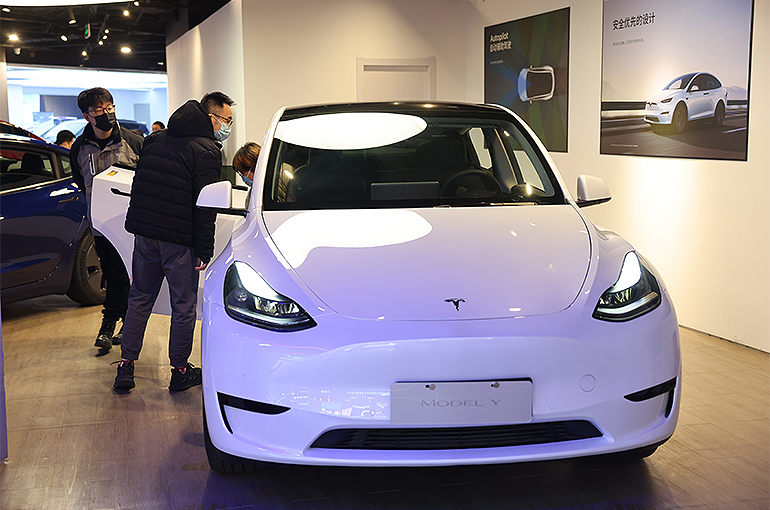 China's EV Price Wars Deepen as BYD, Tesla Slash Prices