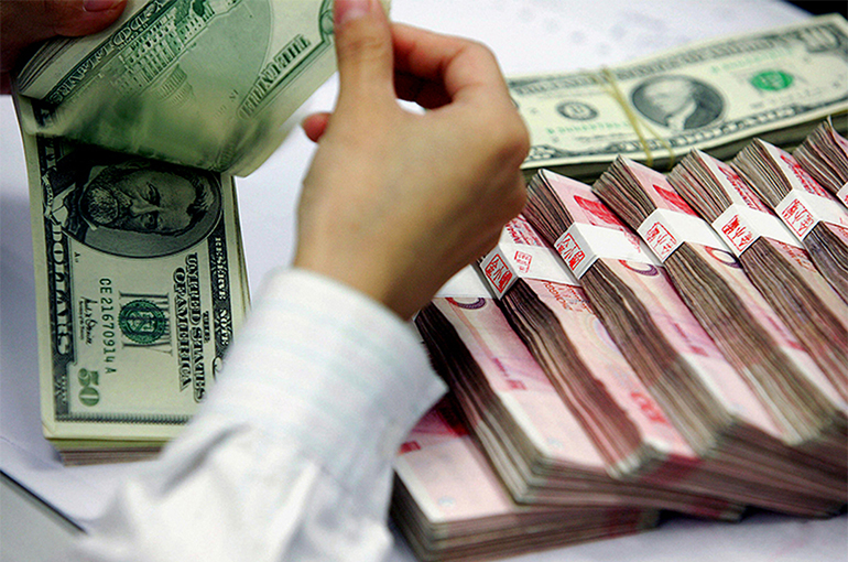 Chinese Yuan Sinks to Seven-Month Low Against US Dollar