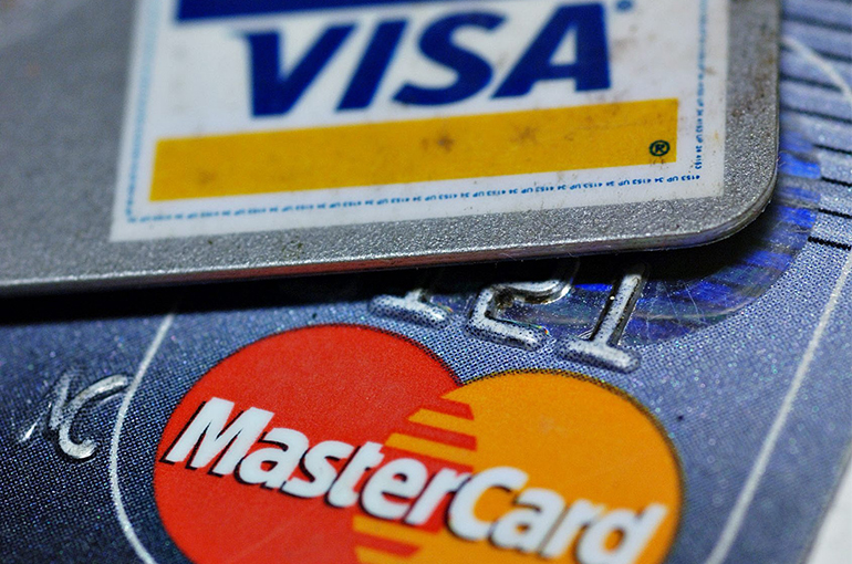 Visa, MasterCard Cut Fees Vendors Charged for Foreign Card Payments in China