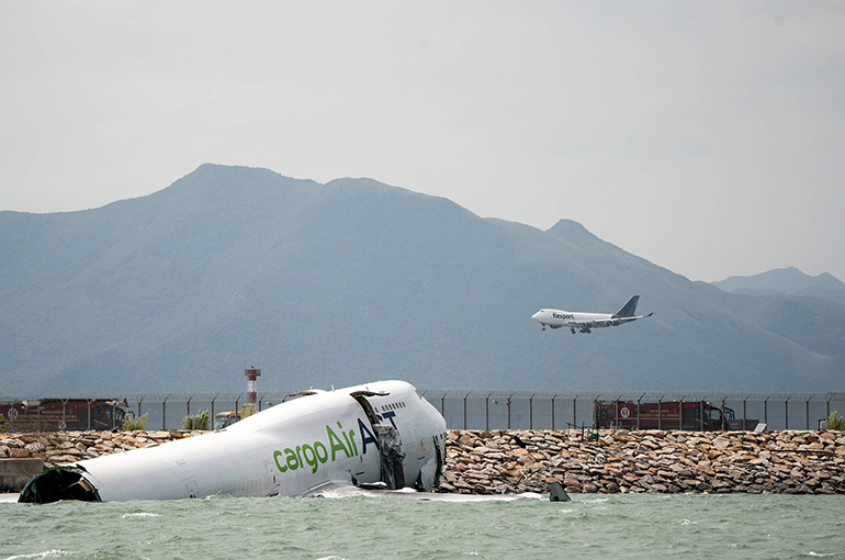 Two Ground Staff Are Killed as Cargo Plane Crashes Into Sea at Hong Kong Airport