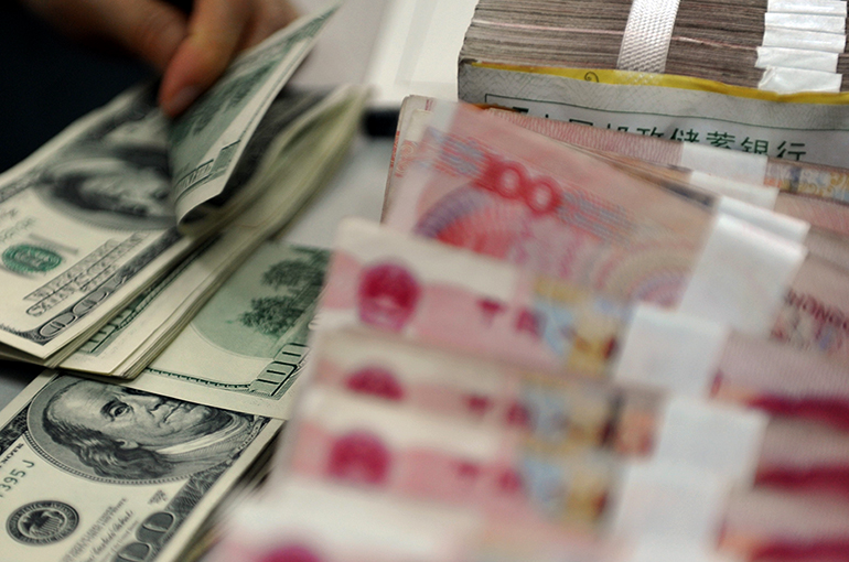 Chinese Yuan Breaches 7 Versus US Dollar for Second Time This Year