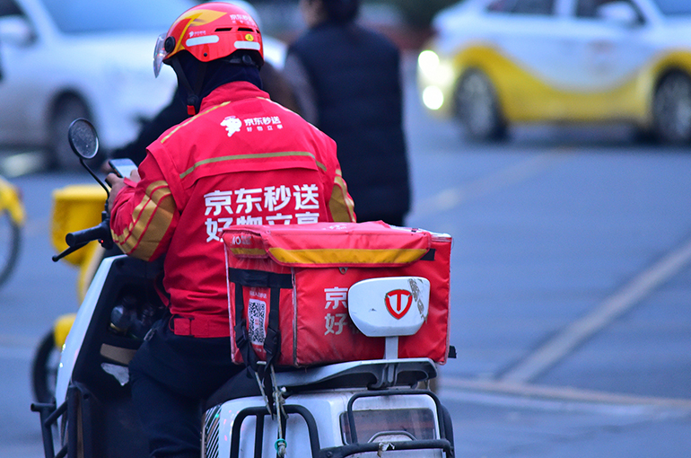JD.Com's Annual Profit Halves on Costly China Food Delivery Push
