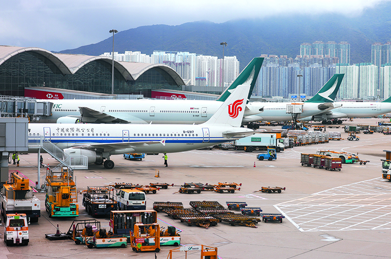 China Flight Prices Fall Pre-Holiday Even as Airlines Raise Surcharges