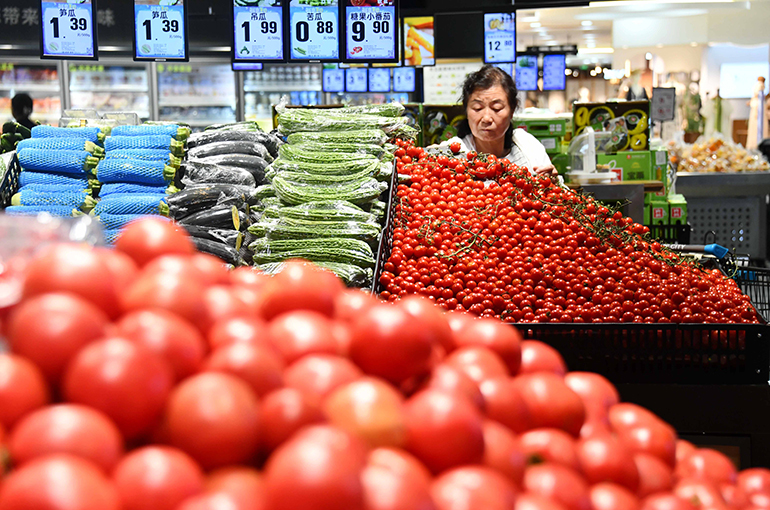 China’s June Consumer, Factory Gate Prices Rise From a Year Ago But Decline From May