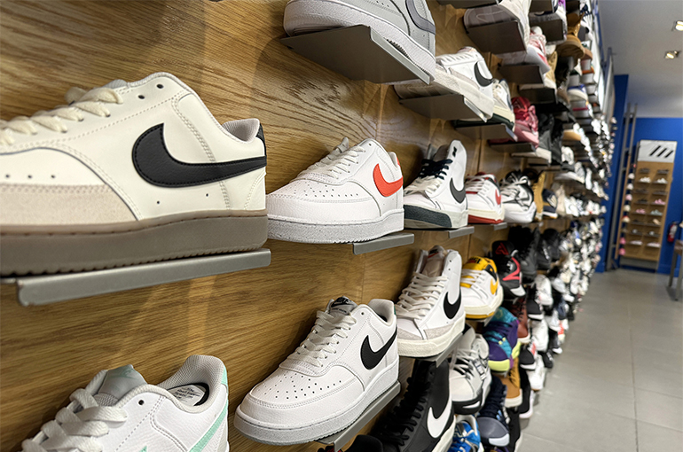 Topsports Slides as Nike Moves to Take Back China E-Commerce Operations