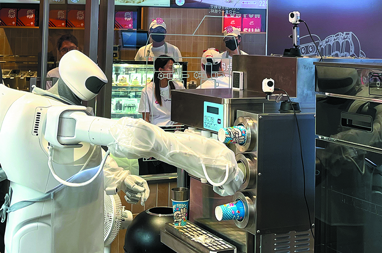Humanoid Robot Starts Work at Dairy Queen's 24-Hour Shanghai Ice Cream Parlor