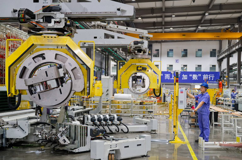 China’s Factory Activity Returns to Expansion in September as Raw Material Prices Surge